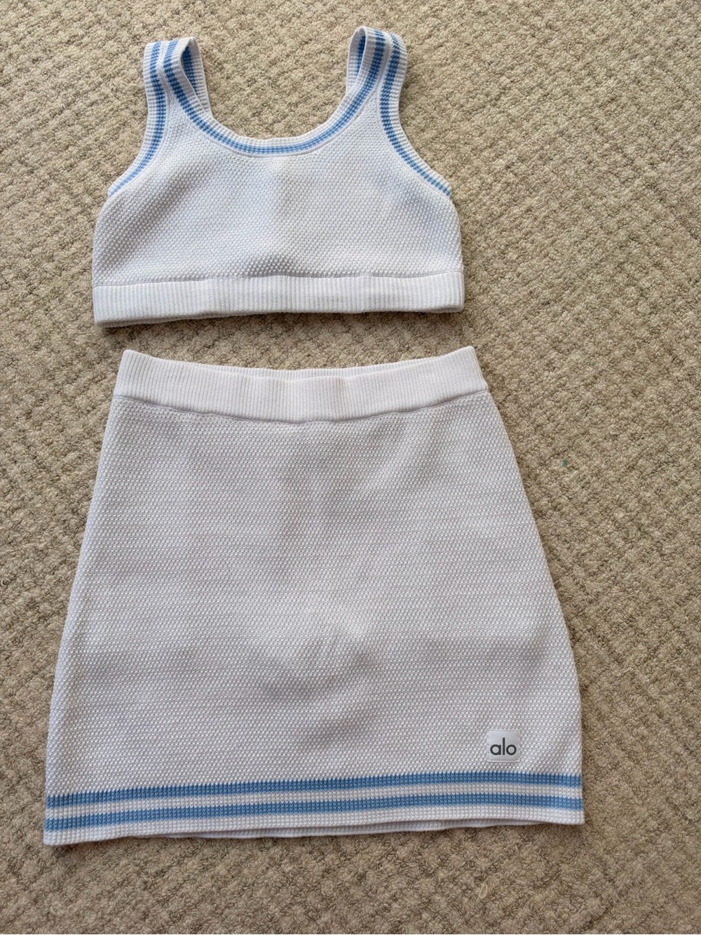 ALO Yoga White Knit Mini Skirt with Light Blue Stripe Hem